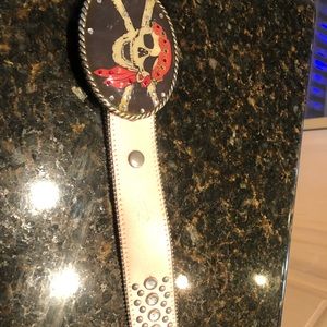 Belt with designer buckle